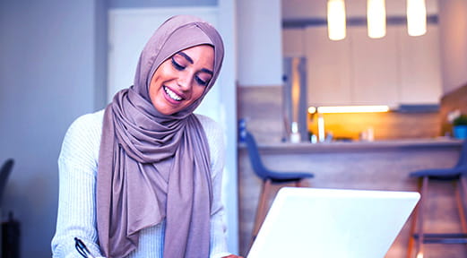 A citizen submits an application through the First Abu Dhabi Islamic Bank to purchase a property for the first time in the Emirates.