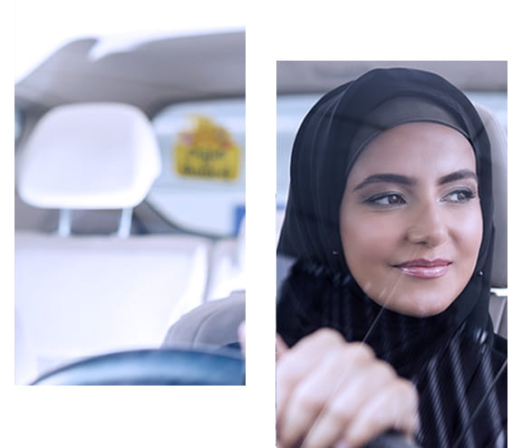 Woman driving her dream car with FAB Islamic Car Finance